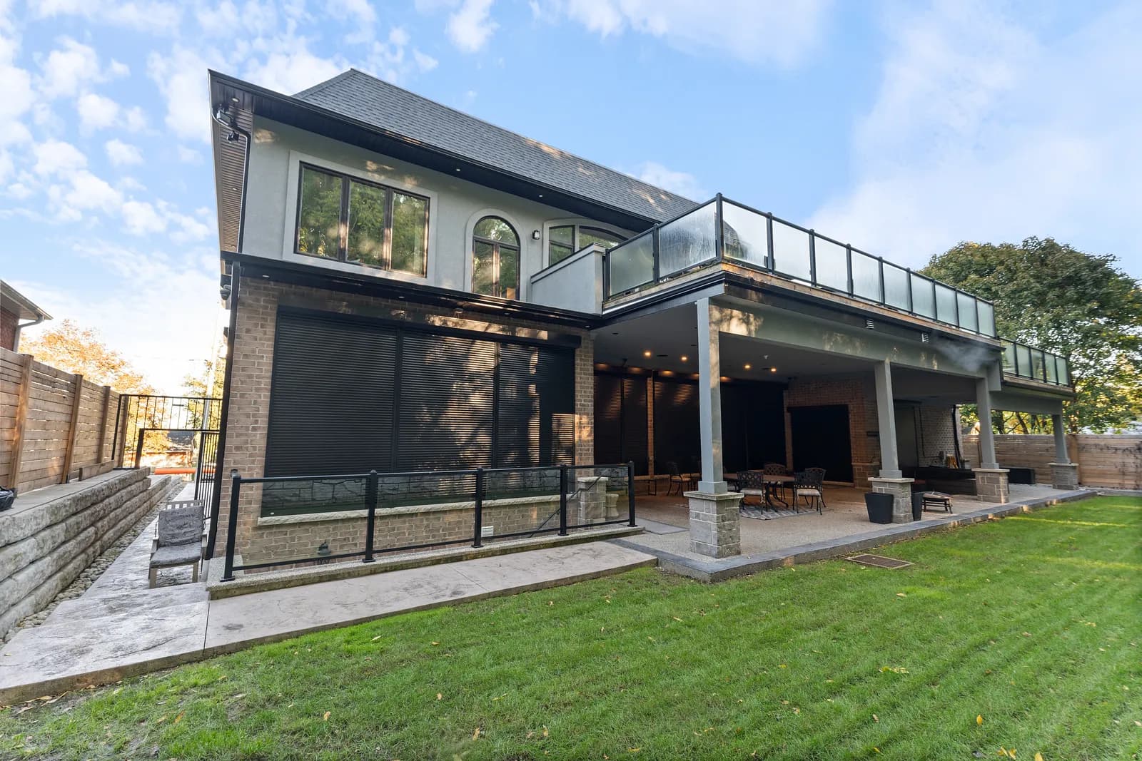 Motorized aluminum roll shutter deployed on a residential window in Ontario