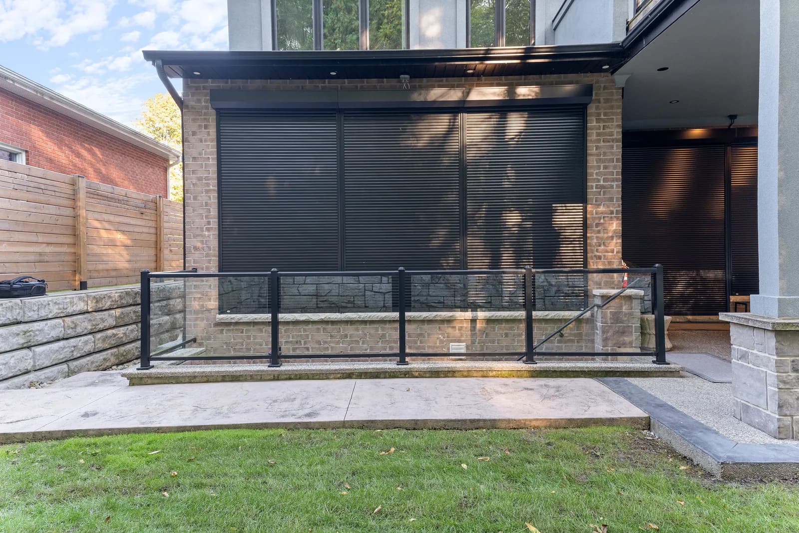 Hamilton residential window with custom-fit roll shutter
